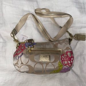 Never used tags still on Coach cross body bag